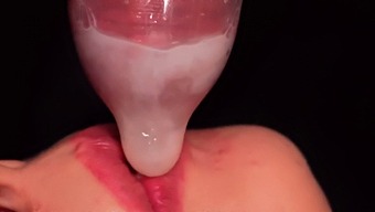Intense Close-Up Of Mouth Milking And Condom Cumshot